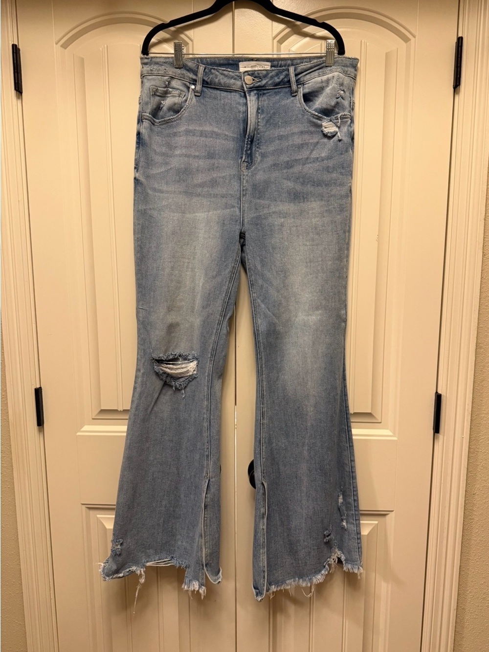 Risen high waist distressed flair in light wash